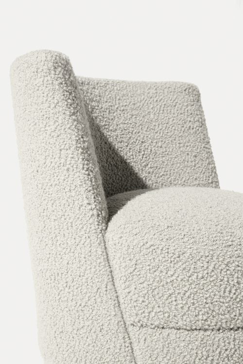Ava armchair with Moka Oak base and covered in fabric
