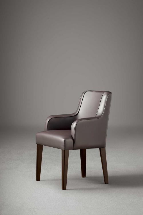 Isabey armchair in Moka Oak finish and covered in leather